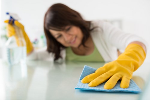 Local cleaners preparing a Hammersmith home for move-in with attention to floors and fixtures