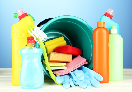 Domestic cleaner working in a Hammersmith kitchen with careful attention to detail